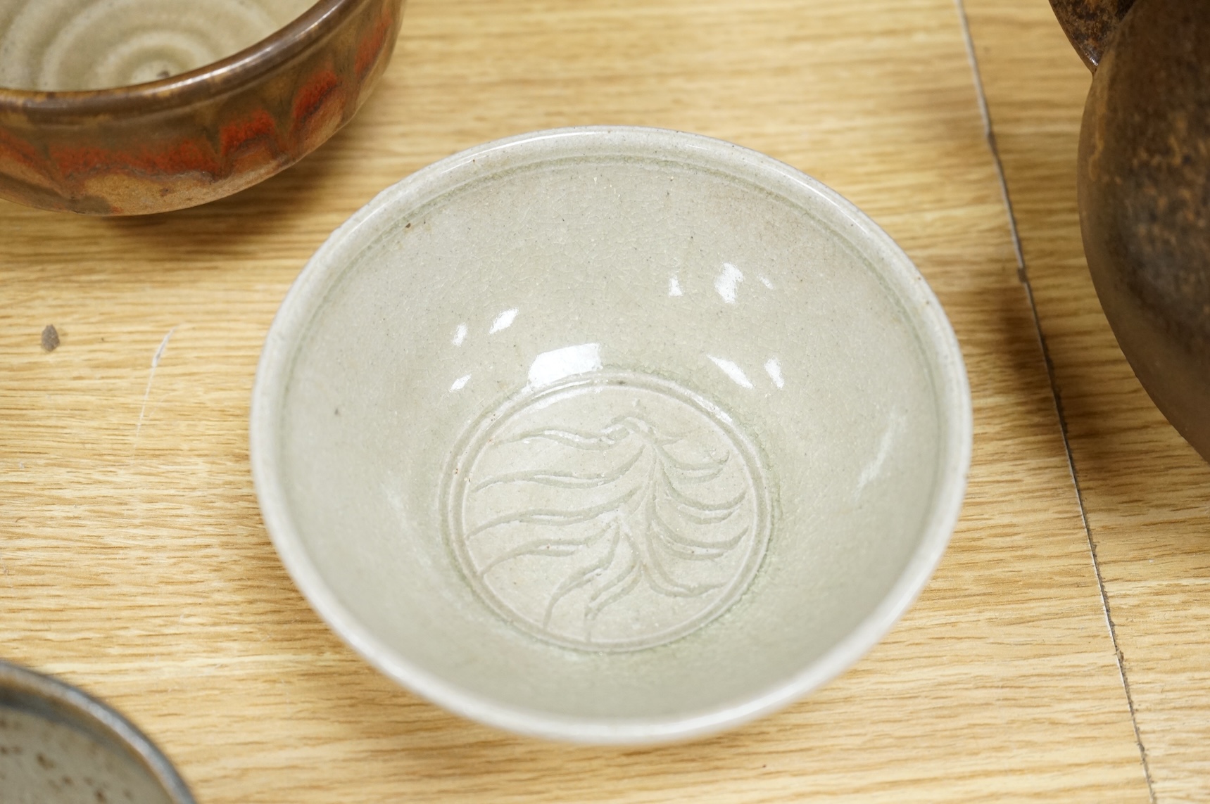 Six pieces of Studio pottery and a vase, largest 32cm high